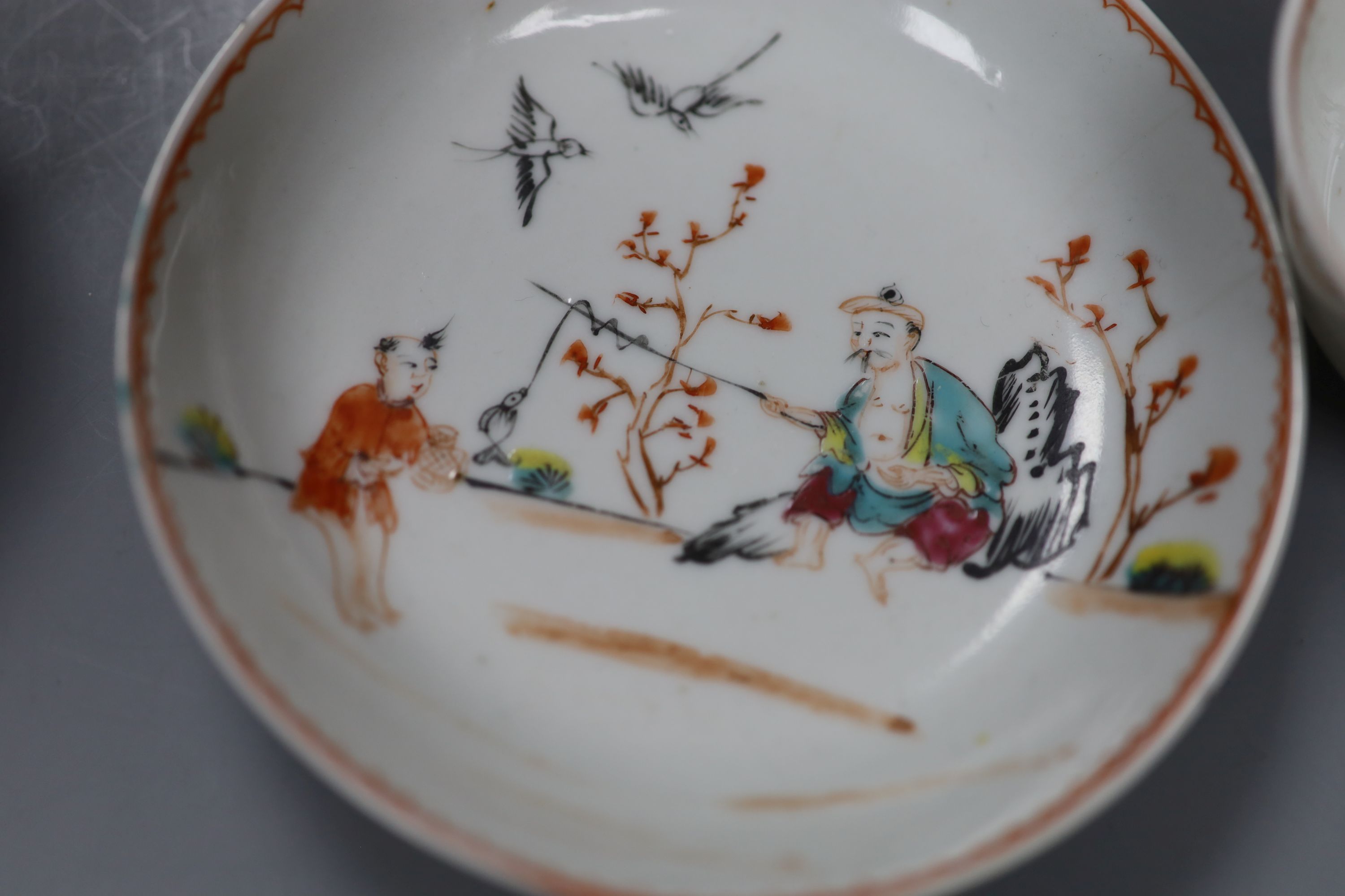 An 18th century Chinese tea bowl and saucer, and a similar tea bowl, height 4cm